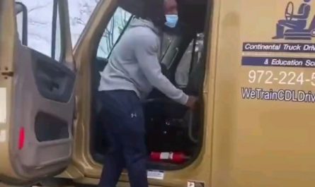 Man parallel parks a semi truck without being inside