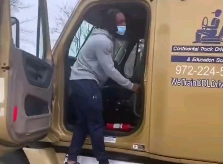 Man parallel parks a semi truck without being inside