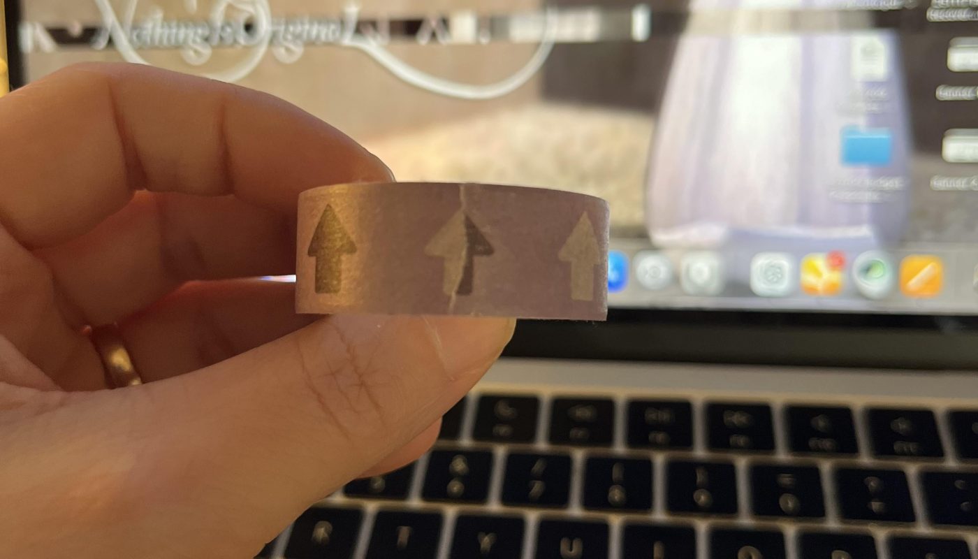 My washi tape just happened to line up the arrows on the tear just right