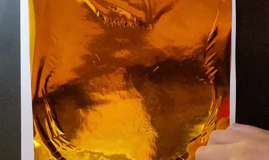 Peeling the foil off my drawing of Desmond the orange cat (OC)