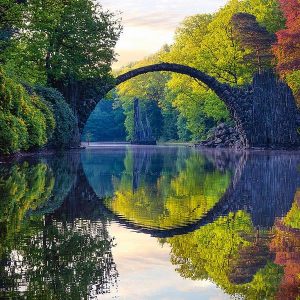 Perfect reflection of the Rakotz bridge in Kromlau, Saxony, Germany
