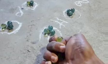 Perfectly aiming marbles with thumb (marbles game)