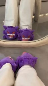 Pokémon slippers that incorporate the wearer's foot into the character design