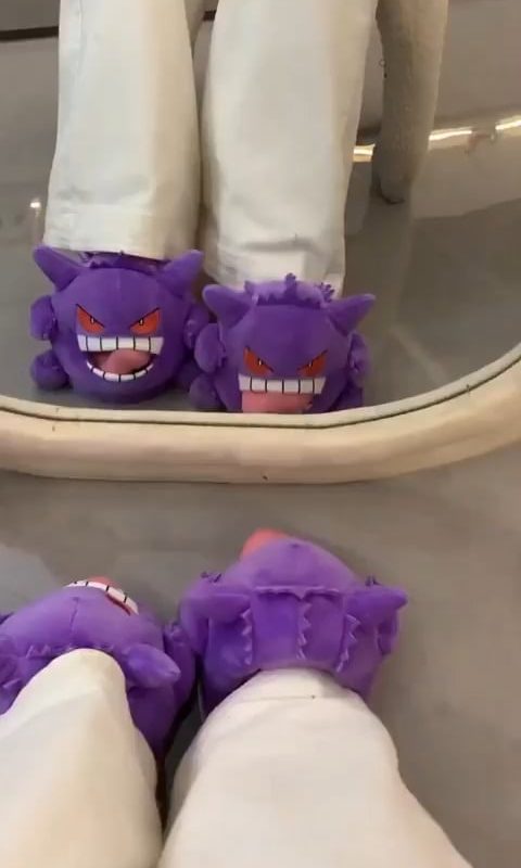 Pokémon slippers that incorporate the wearer's foot into the character design