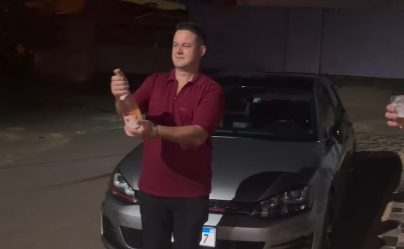 Popping a bottle of champagne at the perfect time.