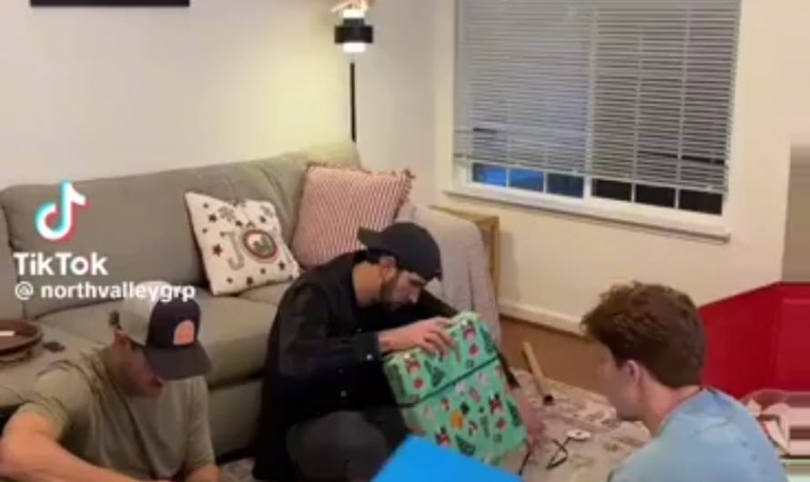 Scissors slicing to wrapping paper