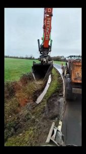 Scoops of joy as a gully is carefully cleaned.