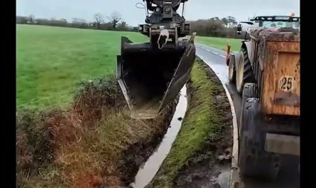 Scoops of joy as a gully is carefully cleaned.