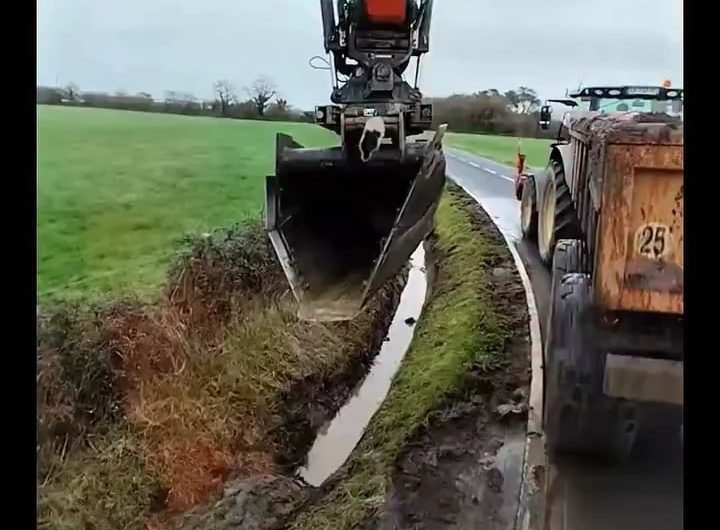 Scoops of joy as a gully is carefully cleaned.