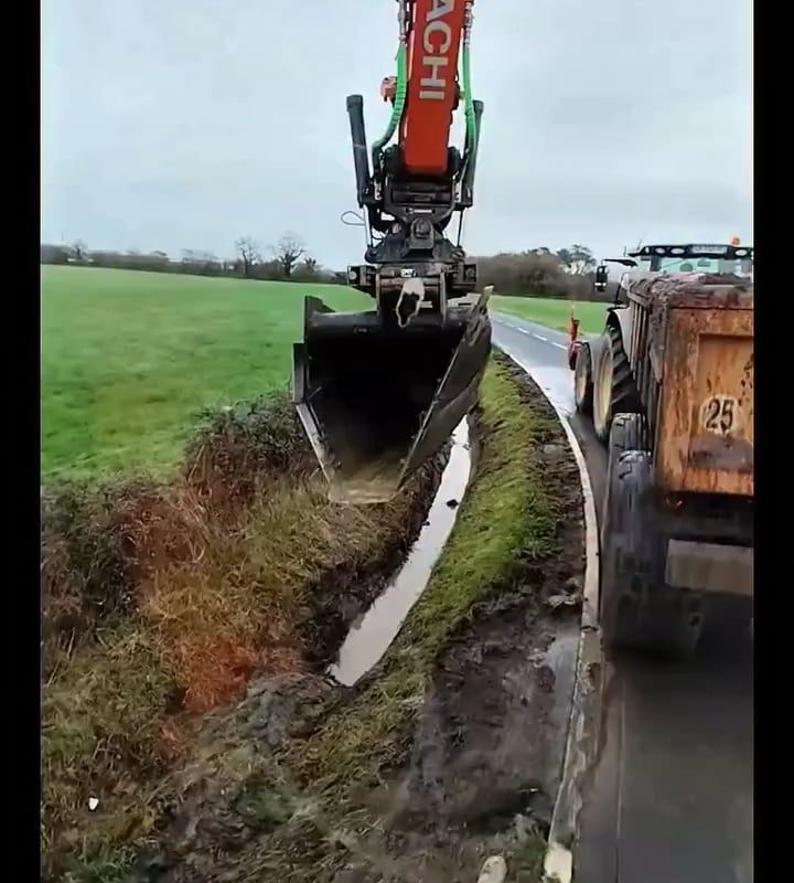 Scoops of joy as a gully is carefully cleaned.