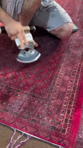 Shaving a rug to trim & smoothen the fibers