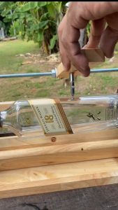 Someone found a cool way to recycle bottles: they cut the glass into smooth drinking glasses… cheap fun and great for the planet…