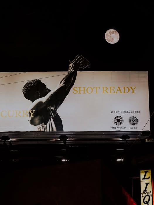 Steph Curry shooting the moon: An  billboard for the release of his book !