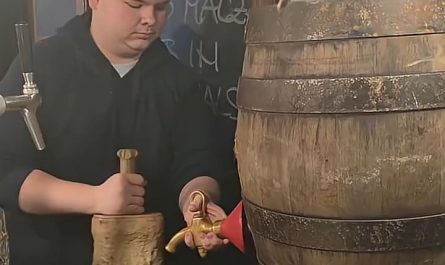 Tapping a traditional wooden keg in Munich