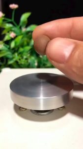 The calm precision of making miniature pottery.