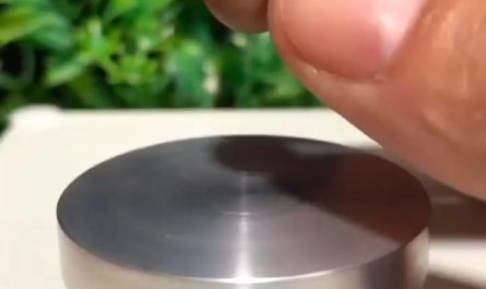 The calm precision of making miniature pottery.