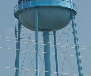 The dent on the Smithville, MS water tower was caused by a Ford Explorer that was picked up by an EF5 tornado in 2011.
