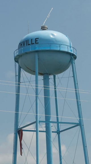 The dent on the Smithville, MS water tower was caused by a Ford Explorer that was picked up by an EF5 tornado in 2011.