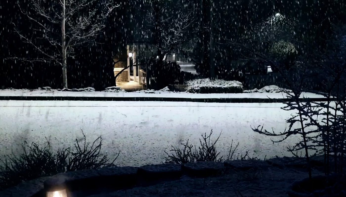 The different speeds of the shadows of these snowflakes on the road