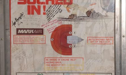 The poster they gave my dad when he survived being sucked into a jet engine