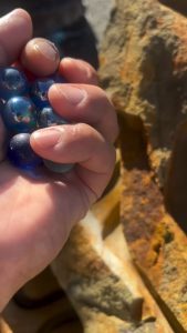 The sound of marbles rolling down this hand-carved stone run