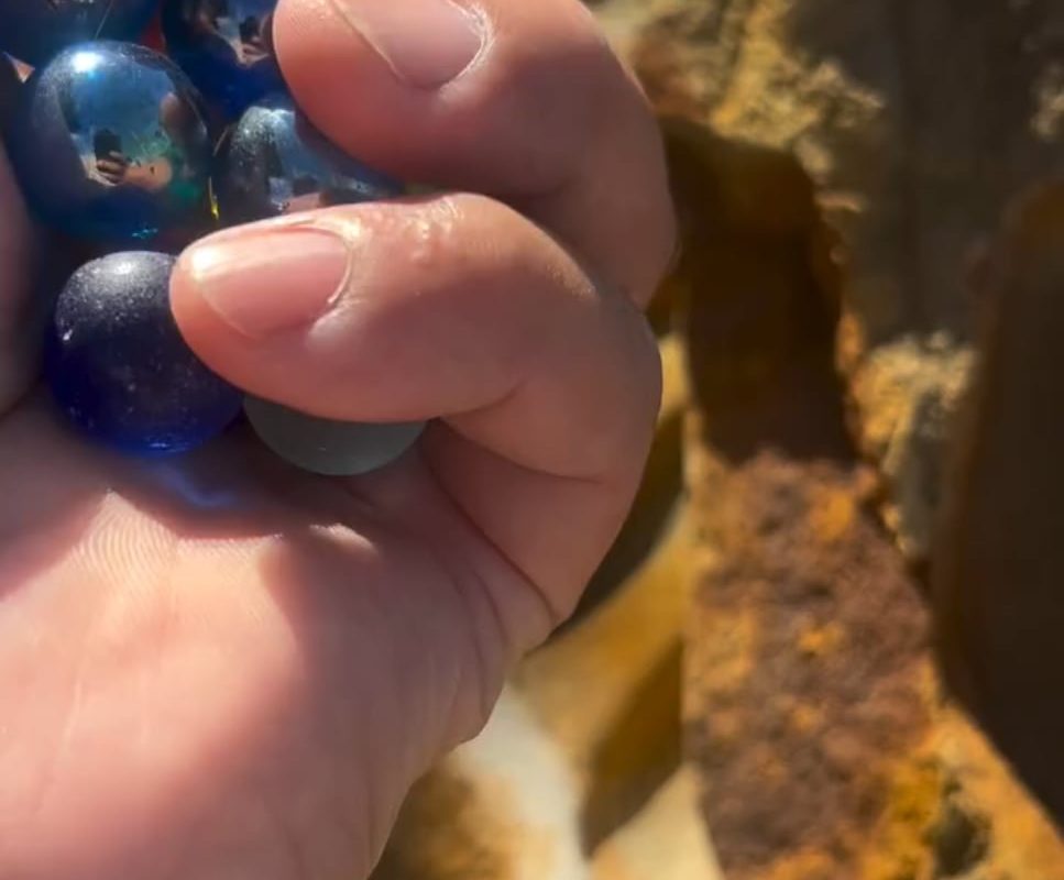 The sound of marbles rolling down this hand-carved stone run