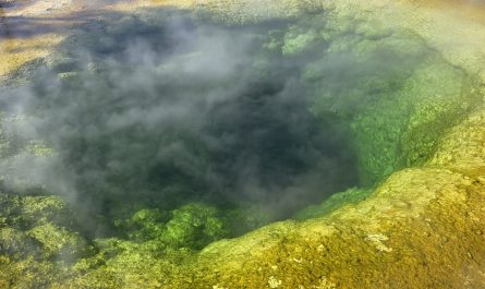 The steam and colorful hot spring waters at Morning Glory Pool, Yellowstone