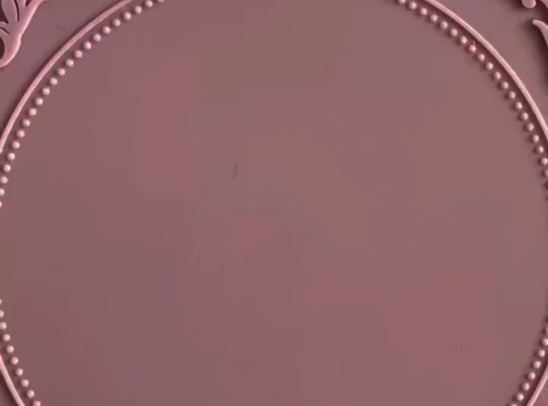 The wax seal being made for use by an artist