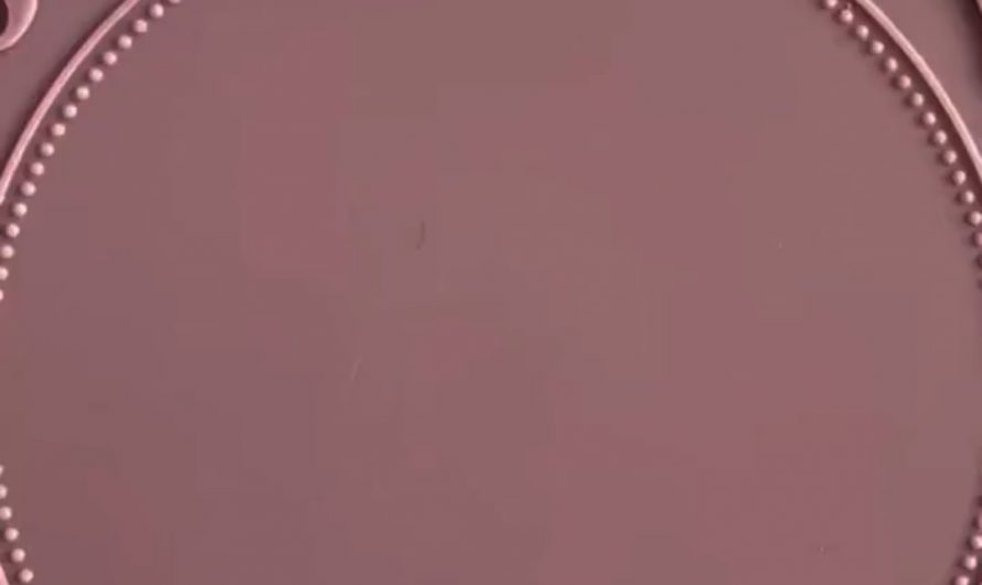 The wax seal being made for use by an artist