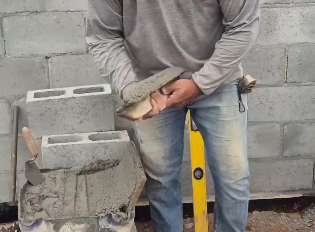 The way he applied cement over those bricks.