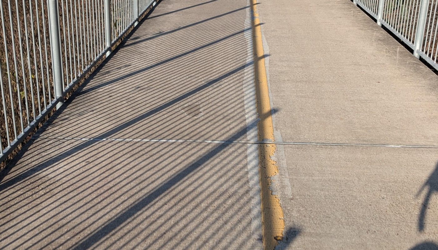 The way the shadow lines up with the paint