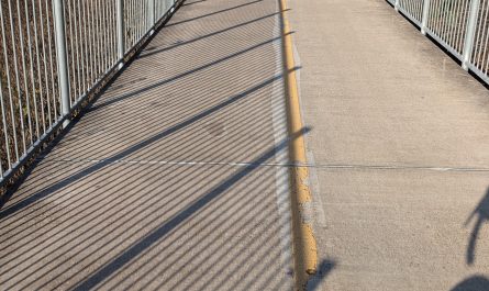 The way the shadow lines up with the paint