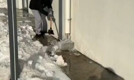 This Removing of Ice From a Downspout