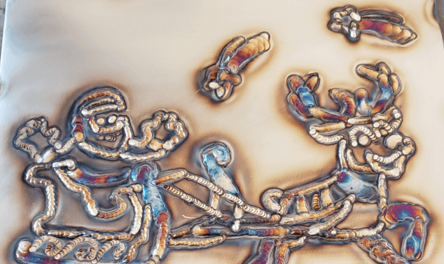 This Santa is drawn completely on metal with a welder