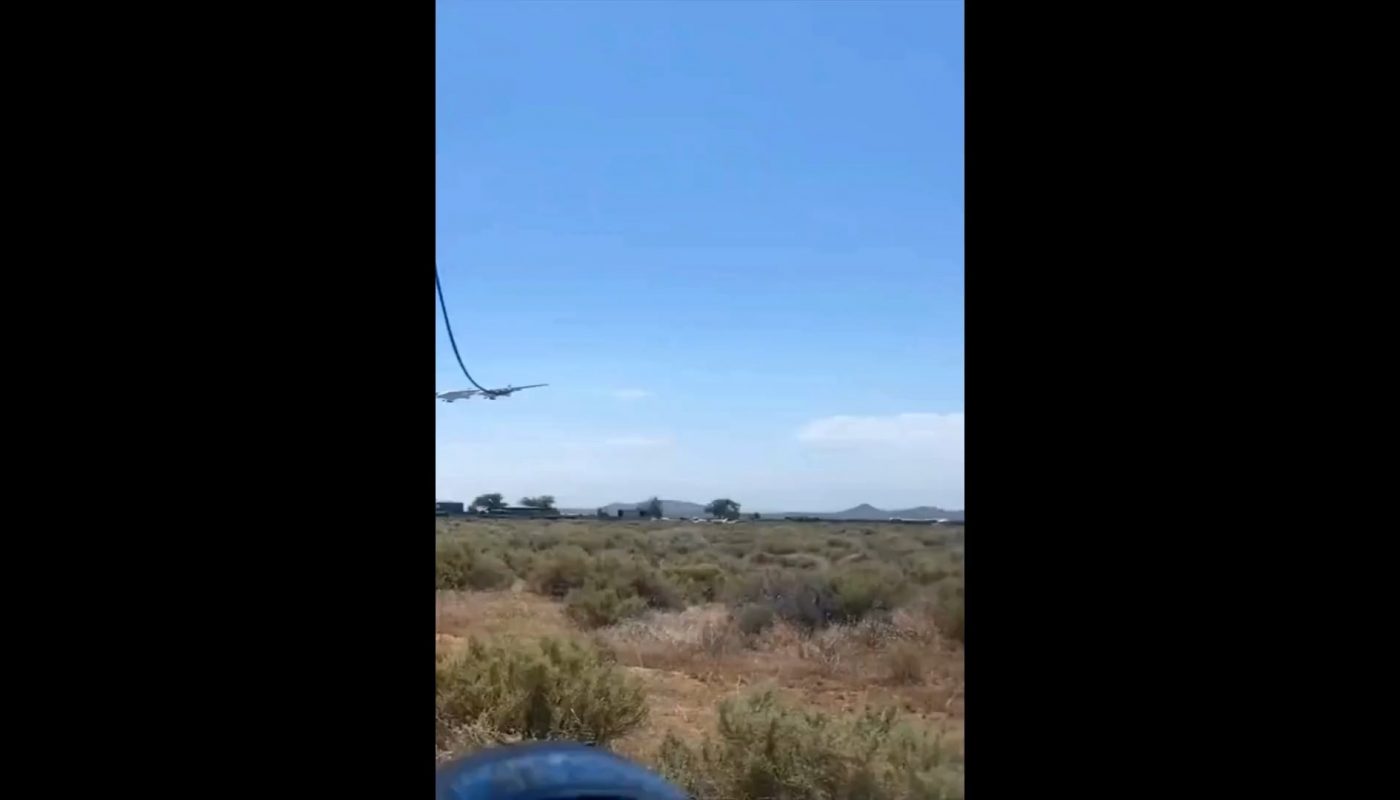 This aircraft flying over California has a wingspan longer than a football field