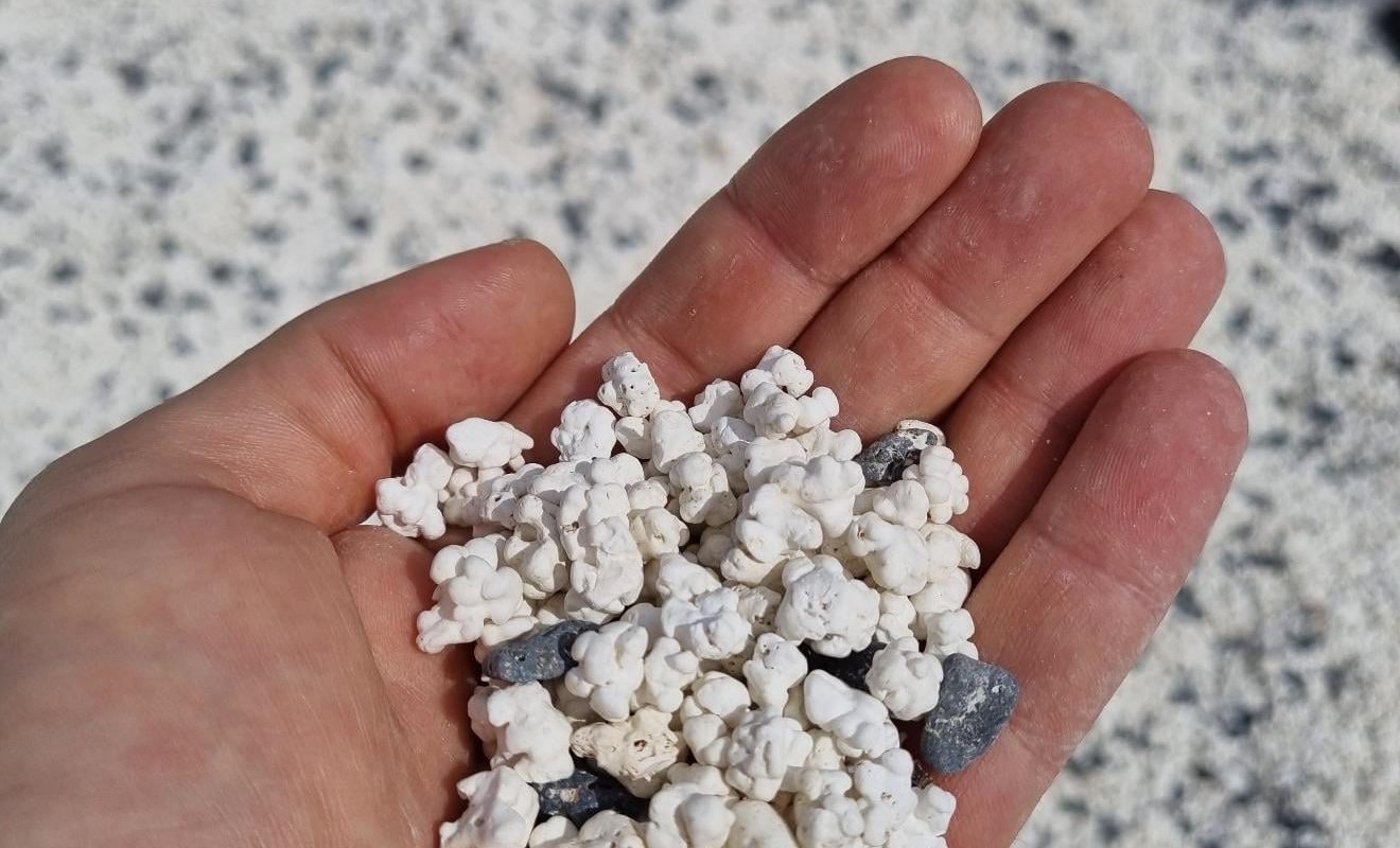 This beach in Fuerteventura is covered in tiny white stones that look exactly like popcorn