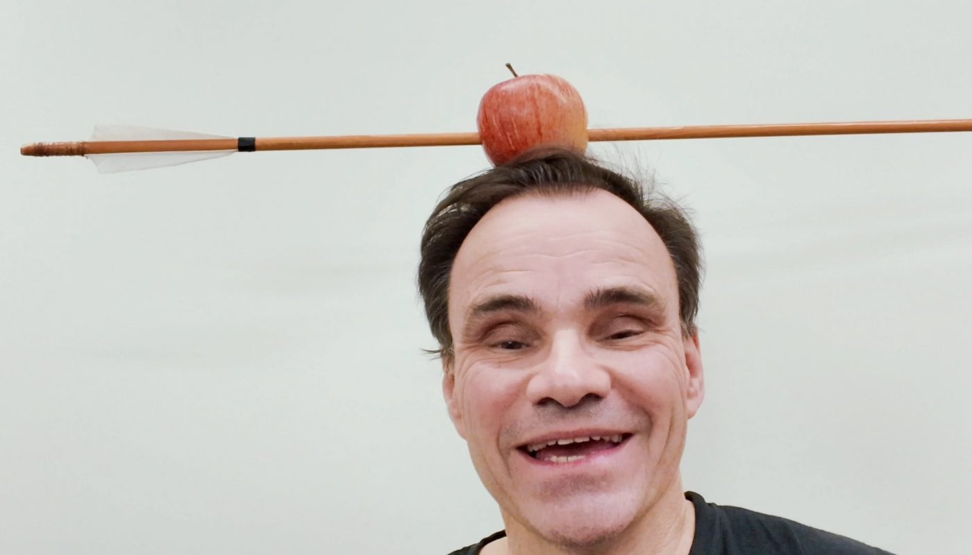 This guy shot an Apple off his head with a rotating arrow