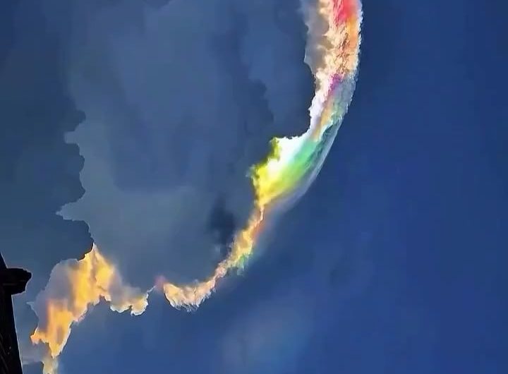 This is an example of an iridescent cloud. It’s created when light is scattered across tiny uniform droplets of water or ice pellets in the atmosphere
