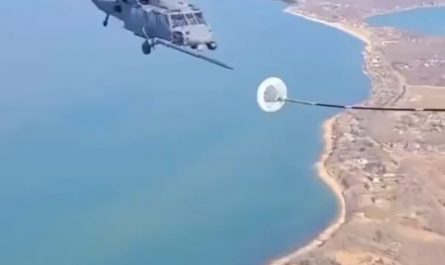This is how helicopters refuel in midair.