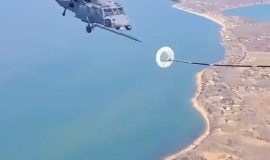 This is how helicopters refuel in midair.