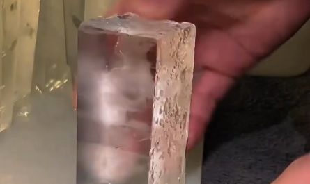 This man cutting ice