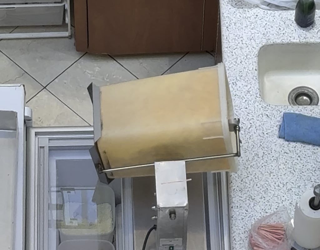 This popcorn coating device