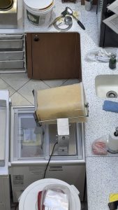 This popcorn coating device