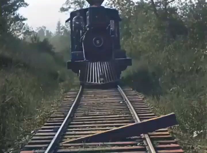 This stunt was real and done by Buster Keaton in “The General” (1926)
