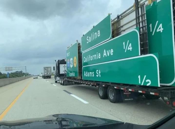 This truck is carrying the signs you see on the interstate