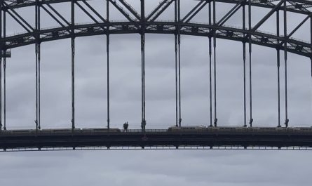 Two trains meeting directly together on the Sydney Harbour Bridge