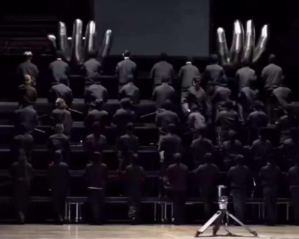 Urban Theory is a prestigious Italian dance collective known for their expertise in Tutting, a dance style focused on detailed hand and arm movements that form geometric patterns and visual illusions.