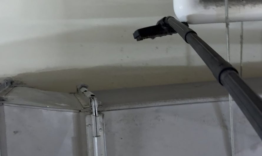 Vacuuming five years of dust off of AC ductwork.