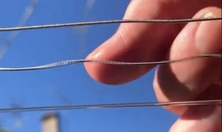 Watching a guitar being played from the sound hole.