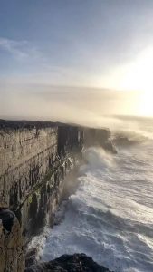 Waves crashing against the cliffs of Inis Meáin, Ireland